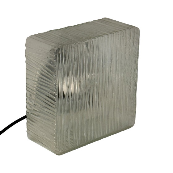 Image 1 of Art deco style lamp made from a metal base that houses an opaline dome. The dome is secured in place with a spring mechanism mak