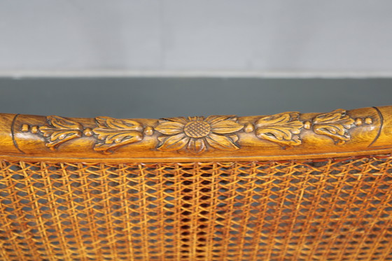 Image 1 of Antico divano intagliato con sponde a canne, Cecoslovacchia