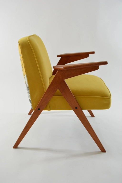 Gele konijnenfauteuil en vogels