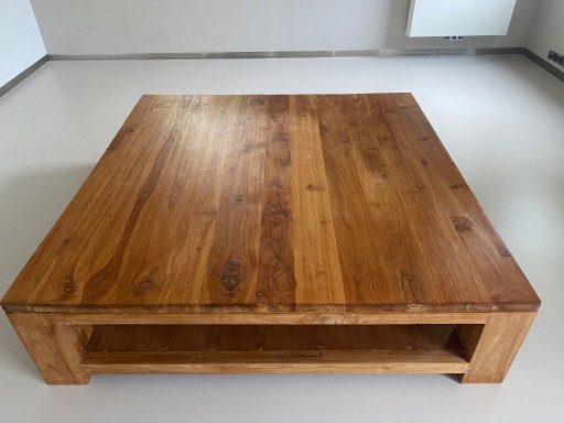 Robust coffee table made of solid hardwood