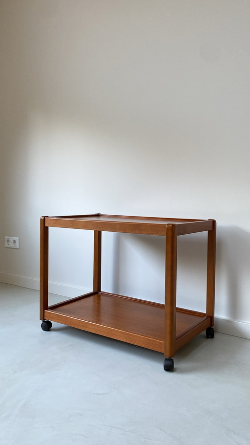 Vintage wooden trolley on wheels