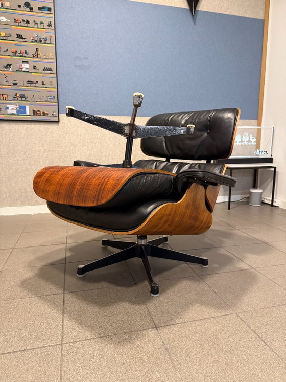 Image 1 of Herman Miller / Contura | Charles & Ray Eames | Lounge Chair & Ottoman | Rosewood & Black Leather | 1x Set