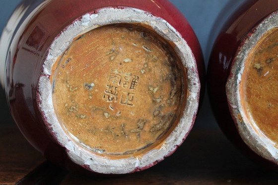 Image 1 of Antique Chinese "sang de boeuf" vase. (one of 2 available)