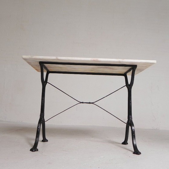 Image 1 of Table de bistrot avec plateau en marbre sur piètement en fonte, PARIS, années 1930