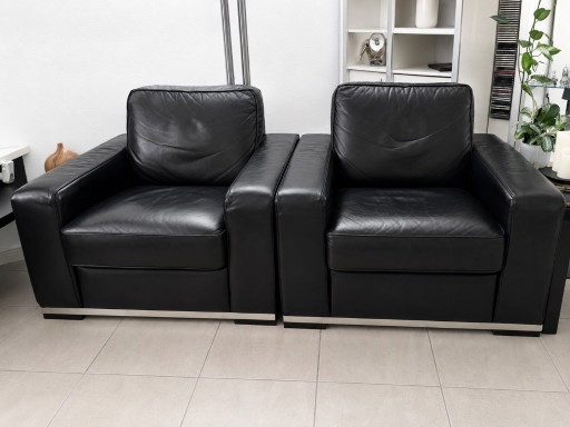 Natuzzi 2 zwart lederen fauteuils – Leather, Aluminium