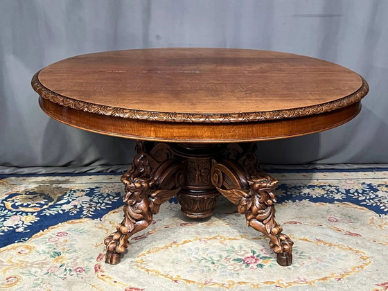 Grande table à manger extensible de style chasse, ornée de quatre figurines de renards sur un pied. (photo 2 of 5)