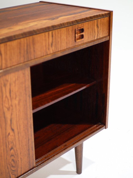 Image 1 of Mobiletto vintage danese in palissandro con ante scorrevoli e cassetto