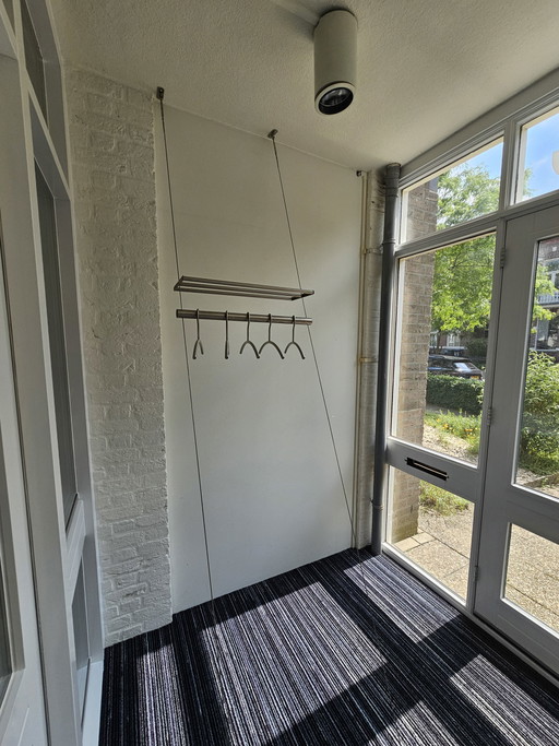 Modern floating coat rack