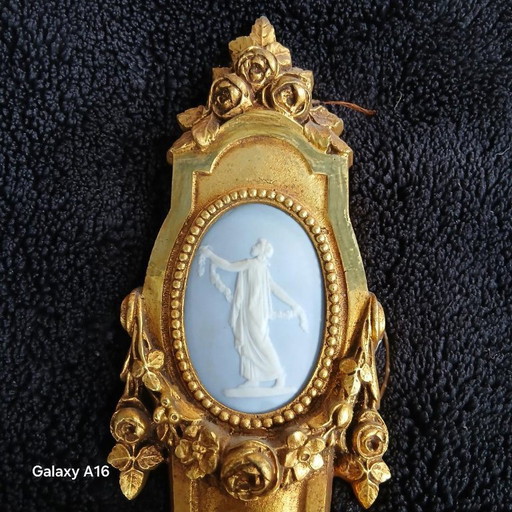 gilt bronze sconces with Wedgwood porcelain medallion signed MH