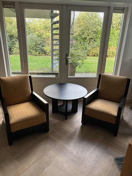 Art Deco style seating area with 2 chairs and a coffee table newly upholstered