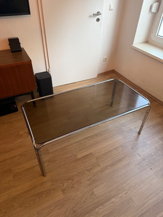 Image 1 of Chromen salontafel met glazen blad, vintage chroom. Breedte: 60 cm / Lengte: 120 cm / Hoogte: 45 cm