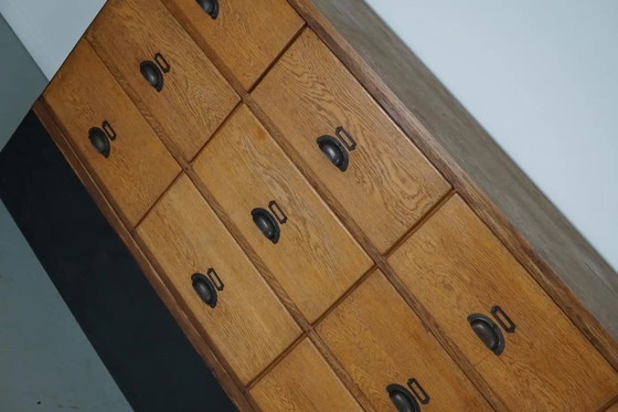 Image 1 of Grote vintage Nederlandse eiken winkelkast / dressoir, jaren 1950