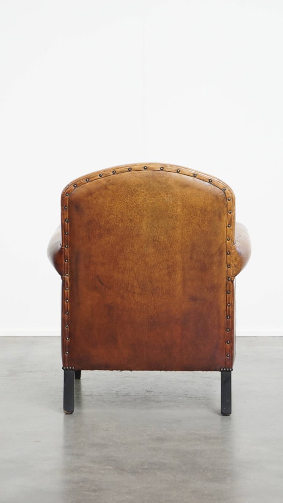 Image 1 of Schapenleren design fauteuil/ armchair in een cognac kleur