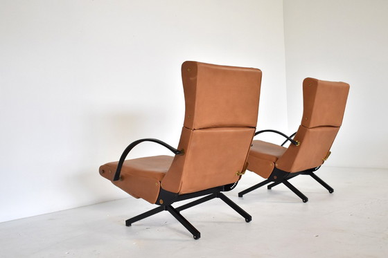 Image 1 of Ein Paar P40 Lounge Chairs von Osvaldo Borsani für Tecno aus cognacfarbenem Leder, 1960er Jahre