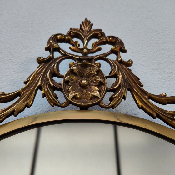 Image 1 of Vintage Goudkleurige Ovale spiegel kuifspiegel schouwspiegel. Koper 