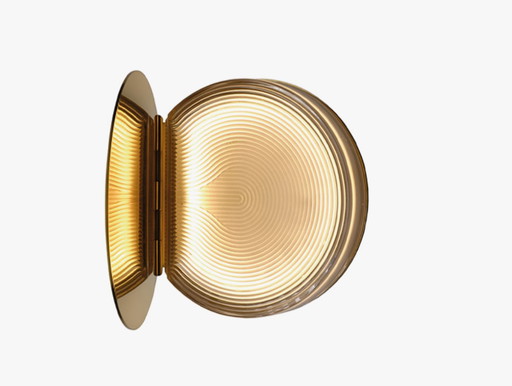 Lampada da parete in polvere compatta