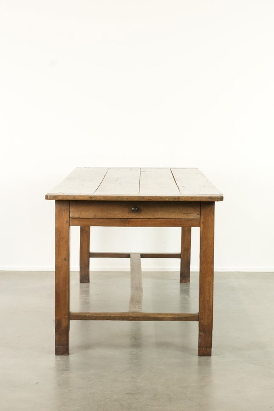 Image 1 of Large antique French farmhouse dining table made of oak from the early 1800s