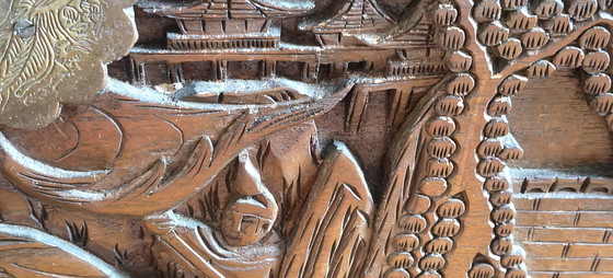 Image 1 of Antique Chinese chest with deep wood carving