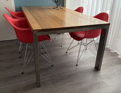 Dining table by Bert Plantagie, model Bridge nutcracker, with stainless steel base 180cm x 100cm, leg width 10cm x 4cm