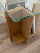 Side table made of veneered oak and tempered glass
