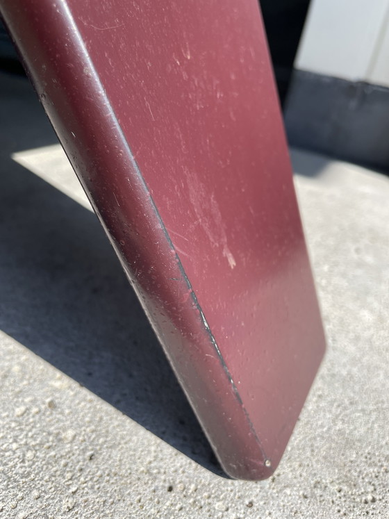 Image 1 of Vintage design coffee table with natural stone top and burgundy base