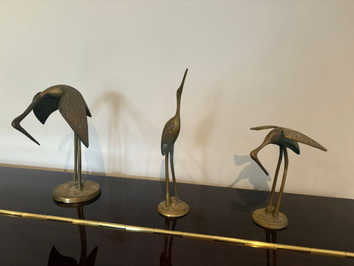 set of 3 brass cranes.
