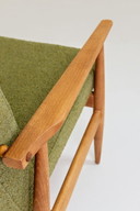 Poltrona vintage design bouclé verde muschio di H.Lis