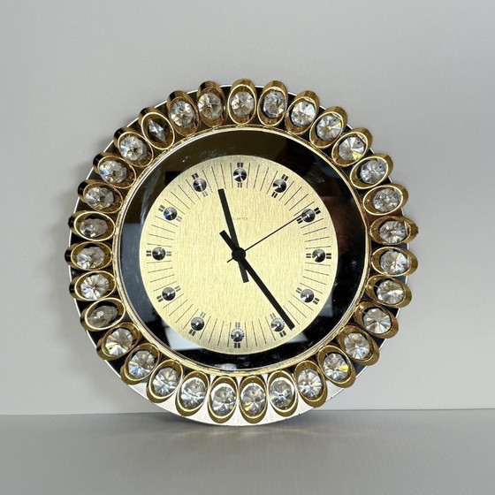 Image 1 of Hollywood regency clock from Junghans, gold and crystal