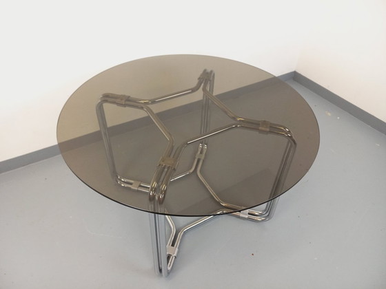Image 1 of Round vintage dining table in smoked glass and chromed metal in the Space Age style of the 70s