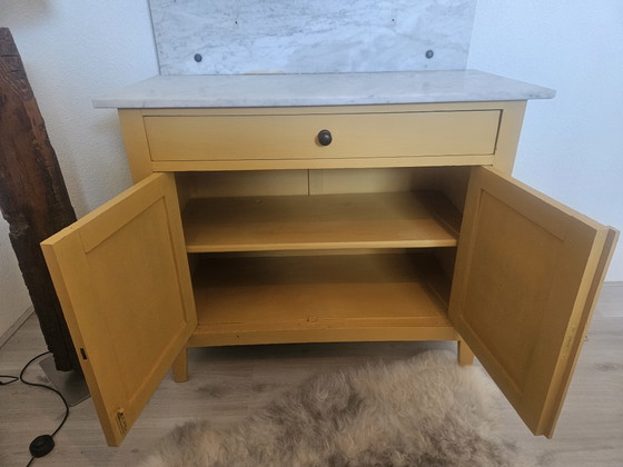 Image 1 of Vintage ochre yellow sideboard with marble top and mirror