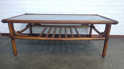 Rohé coffee table with smoked glass and leather bindings