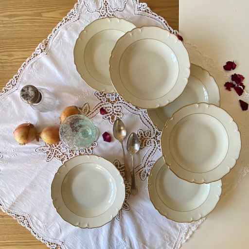 Set of 6 antique off-white porcelain soup plates with gold rim, Limoges ULIM