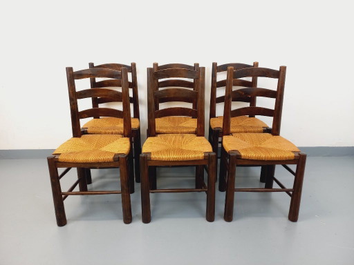 Suite de 6 chaises brutalistes vintage Georges Robert en bois et paille des années 50 60