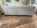 Divano Flexform Victor a 3 posti con rivestimento sfoderabile.
