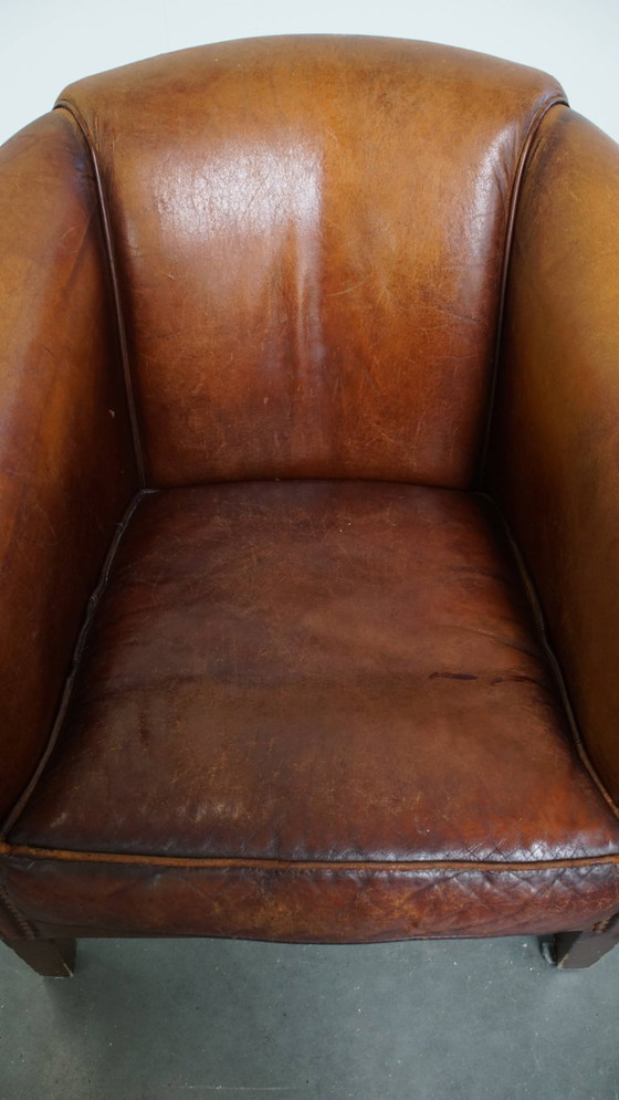 Image 1 of Stoere cognac kleurige schapenleren clubfauteuil 