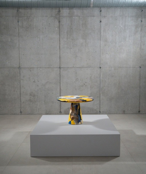 Tavolino laterale con contenitore per fusione