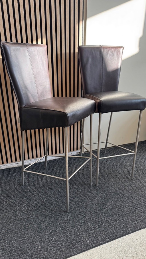 Two leather bar stools brand Foucault