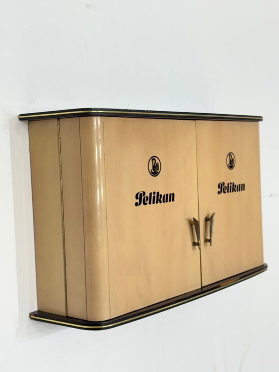 Image 1 of Beautiful vintage Pelikan wall cabinet, wall cupboard, hanging display cabinet, mid-century modern