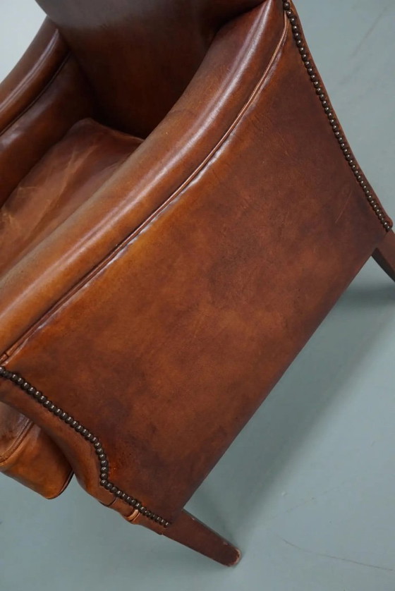 Image 1 of Vintage Nederlandse clubfauteuil van cognackleurig leer