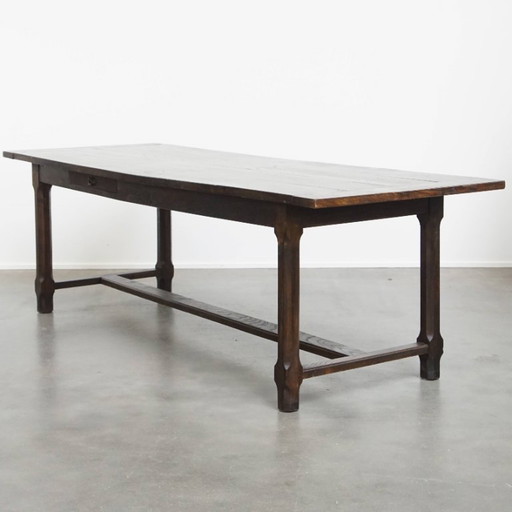 Long antique English elm dining table from early 19th century