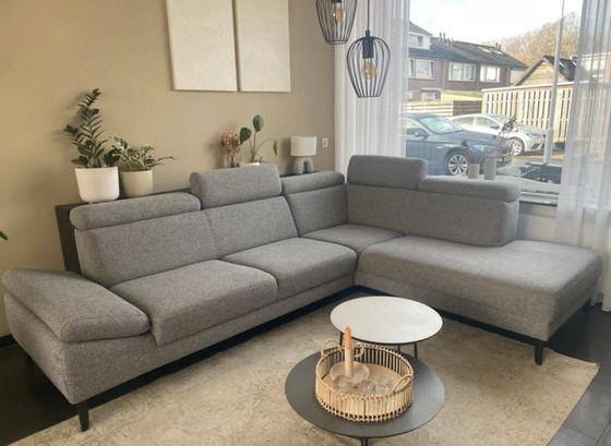 Image 1 of Divano angolare Montel con pouf grigio