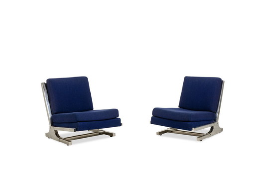 Valérian Rybar Pair of armchairs and pouf in chromed steel. 1970s