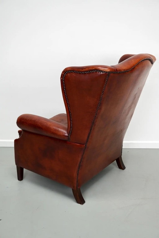Niederländischer Vintage Ohrensessel in Cognac-Farbe aus Leder