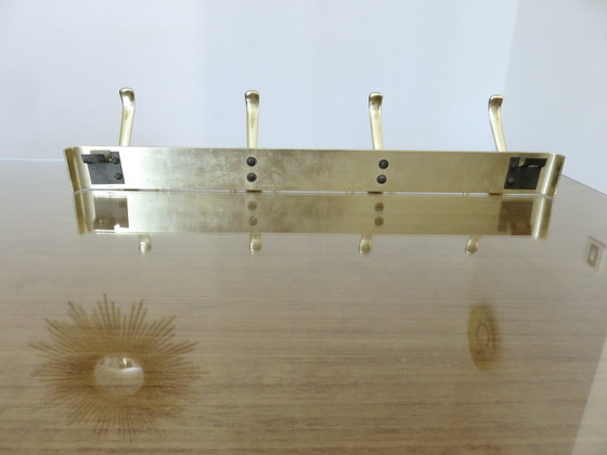 Image 1 of Large wall-mounted coat rack in gilded aluminum, France, 1970