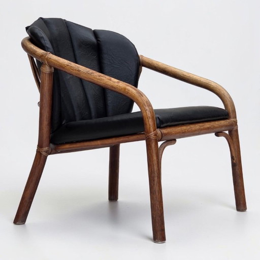 1970s, Danish armchair, rattan, black artificial leather.