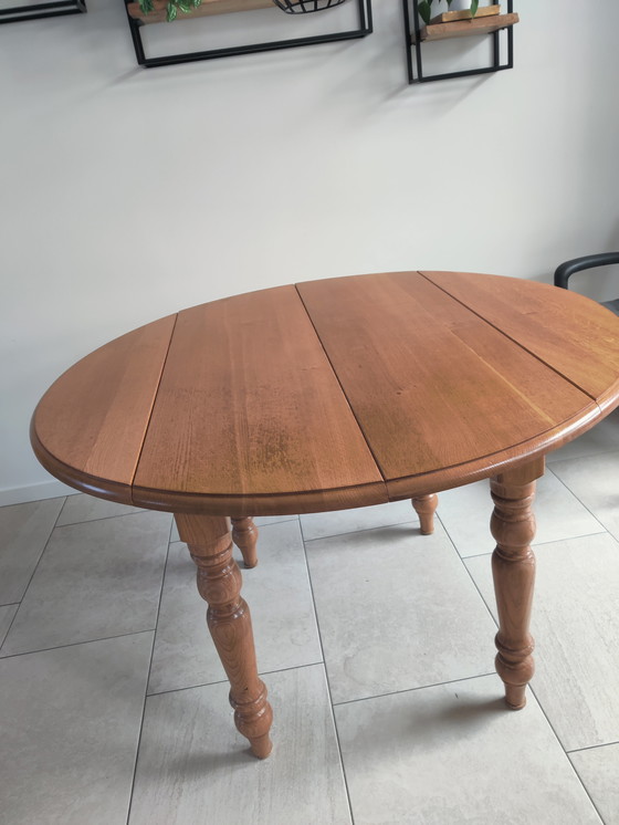 Image 1 of In large adjustable oak table