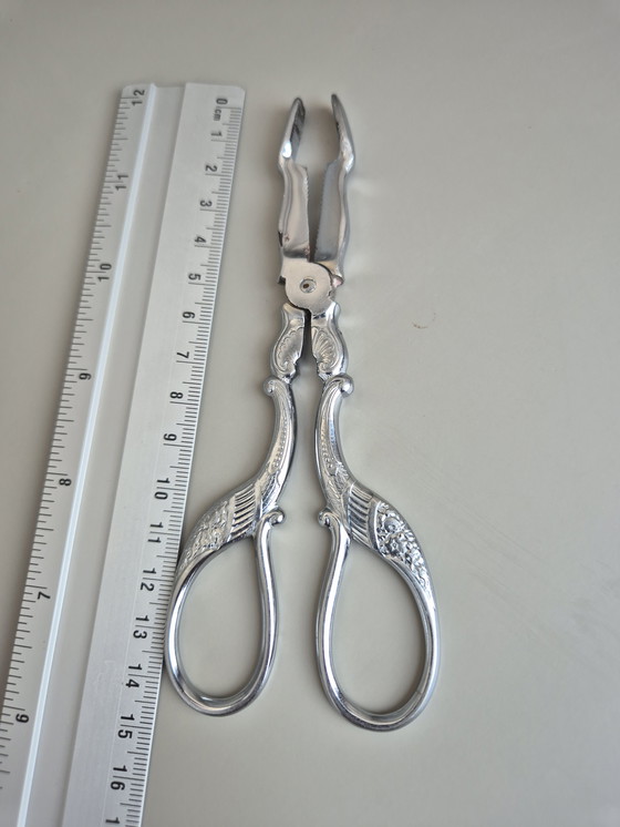 Image 1 of Pinze da portata vintage in metallo cromato - stile barocco decorativo
