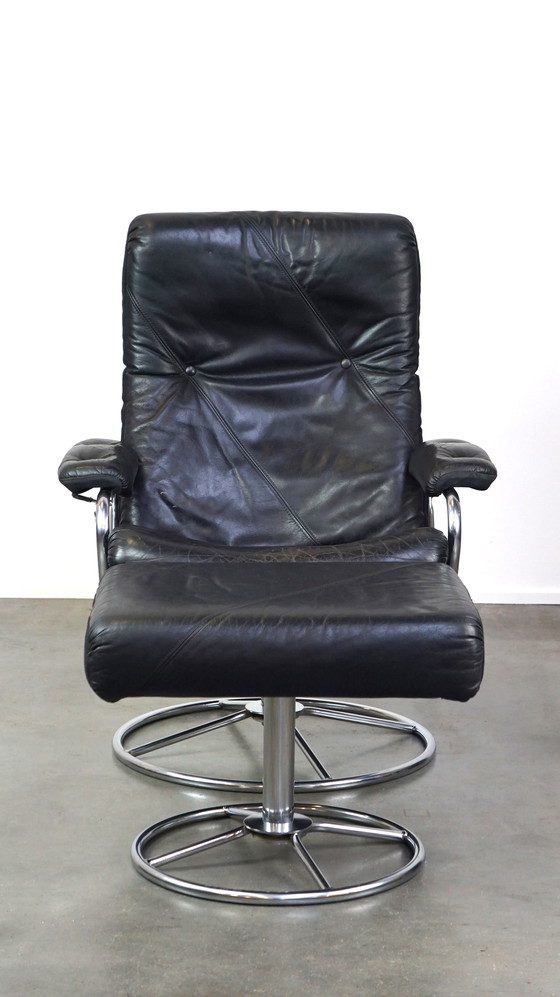 Image 1 of Fauteuil pivotant + pouf en cuir de vachette noir