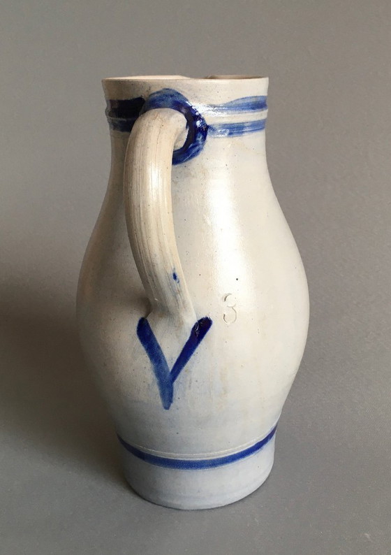 Image 1 of Grand pichet à eau de Cologne ancien en grès salé