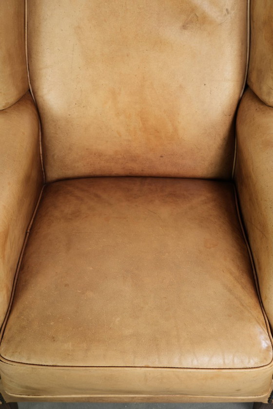 Image 1 of Lichte rundleren oorfauteuil met een goed zitcomfort